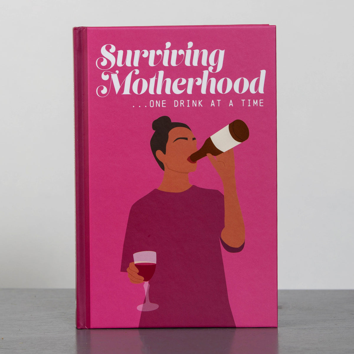 Surviving Motherhood One Glass of Wine at a Time