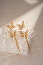 Elegant gold butterfly earring with dangling chain
