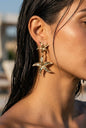 Elegant gold starfish earrings with mother-of-pearl