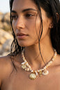 Natural shell bead necklace with palm tree pendants