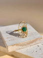 Adjustable oval stainless steel ring with sun motif and stone: Green