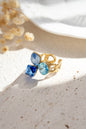 Women's gold-tone stainless steel ring with 3 gradient-color crystals: Royal blue